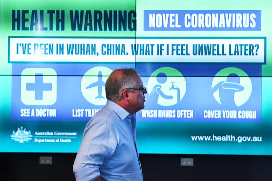 Scott Morrison is updated on the steps being taken to control coronavirus at the health department’s national incident room in Canberra
