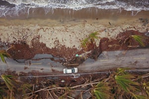Damaged road in the aftermath of Hurricane Maria