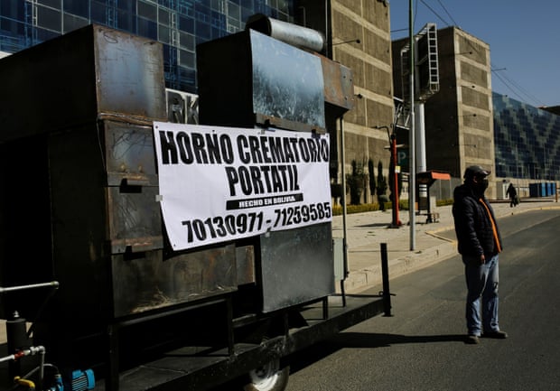 A prototype of a mobile crematorium in La Paz with a banner reading ‘Mobile crematorium, Made in Bolivia’, built by a local engineer to alleviate the backlog of bodies at local crematoriums.