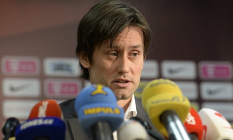 Tomas Rosicky announces his retirement during a press conference in Prague.