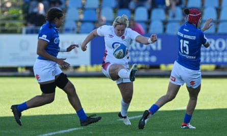 The England captain, Marlie Packer, clears upfield.