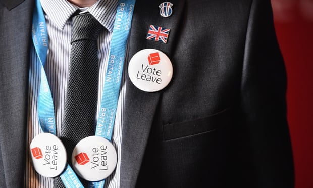 A man with vote leave EU badges.