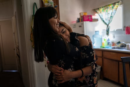 Karen hugs her mom in their kitchen on Mother's Day in Orange County, California.