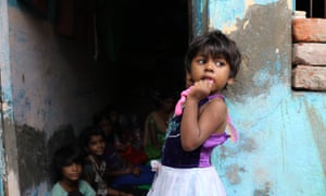 Children work packing balloons in Tahir Pur, home to the largest leprosy colonies in Asia