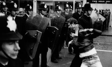 Police confront an anti-fascist protestor in Southall, April 1979.