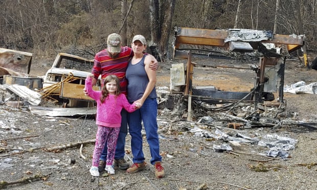 A family in Otis, Oregon, after a wildfire destroyed their home and nearly 300 others in September 2020.