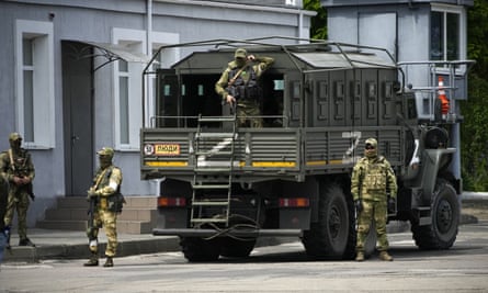 Russian soldiers pictured in Kherson region in May.