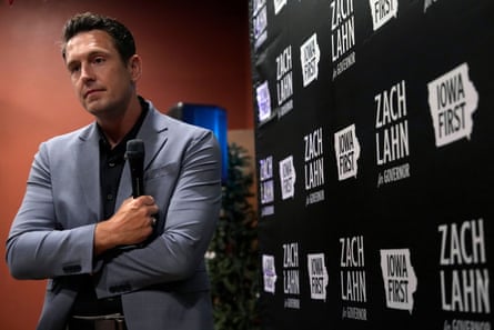 A man holds a microphone