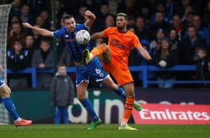 Newcastle United’s Joelinton (right) tussles with Rochdale’s Eoghan O’Connell.