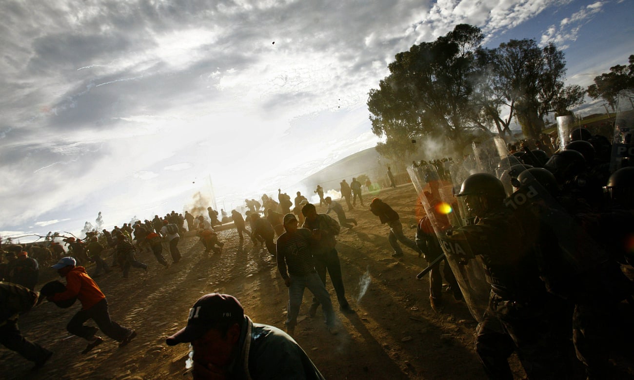 Ecuadorian natives clash with the police 30km from Quito in 2010 in protest of a proposed water privatisation measure.