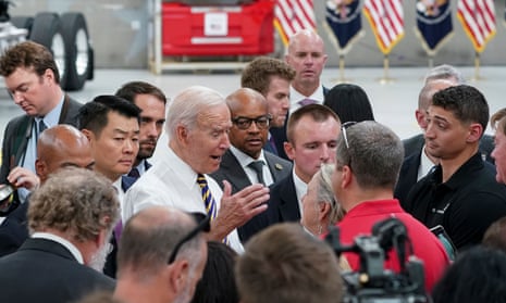Biden at a truck factory in Pennsylvania last week. ‘This deal signals to the world that our democracy can function, deliver, and do big things,’ he said.