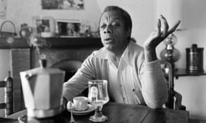 James Baldwin poses at his home in Saint-Paul-de-Vence, southern France in 1979.