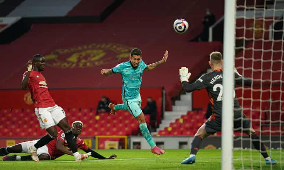 Roberto Firmino heads Liverpool’s second goal past Dean Henderson.