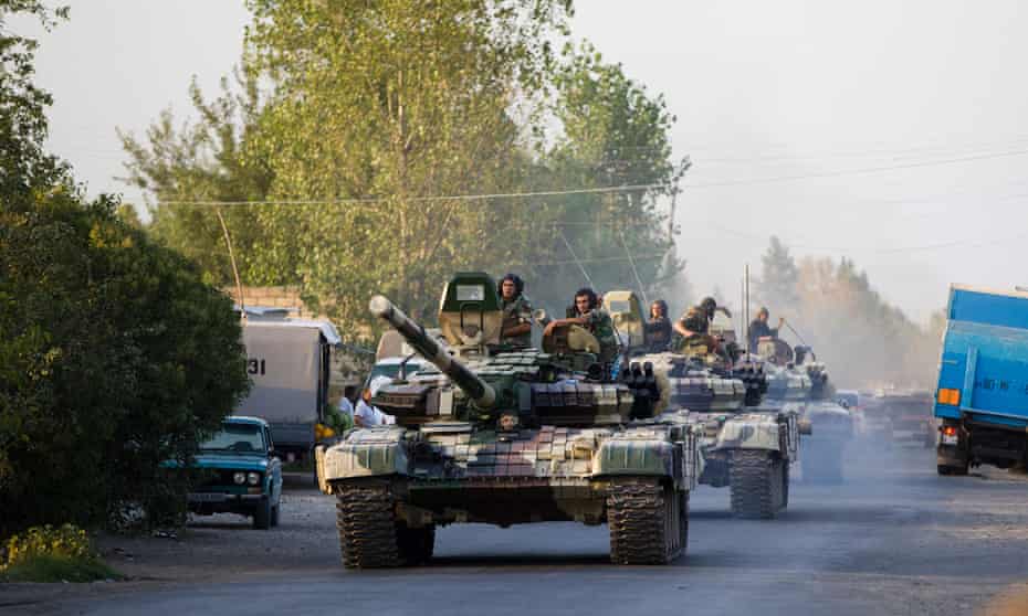 Azerbaijani army tanks mobilise during an escalation in fighting between Azerbaijan and Armenia in 2014. 