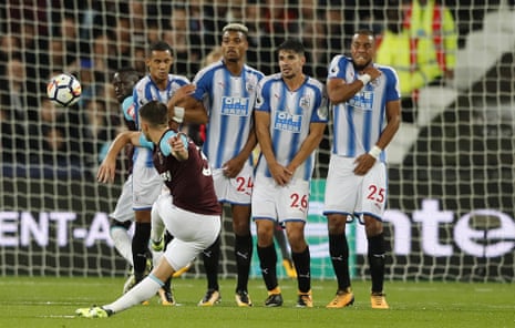 Aaron Cresswell gets a free-kick all wrong and the ball curls harmlessly over the bar.