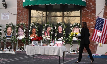US vice-president Kamala Harris leaves flowers at a makeshift memorial at the Star Ballroom dance studio.