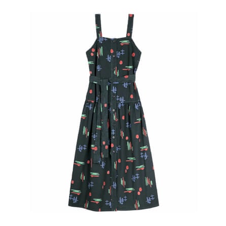 A dark grey strap dress with bold geometric print in purple red and bright green. There are dark grey buttons down the centre.