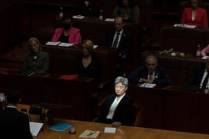 A ray of sunshine falls on Labor Senate leader Penny Wong during a condolence motion for the late senator Kimberley Kitching in the senate chamber.
