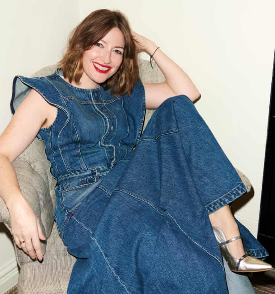 Kelly Macdonald wears denim dress by chloe.com and silver heels by malonesouliers.com.