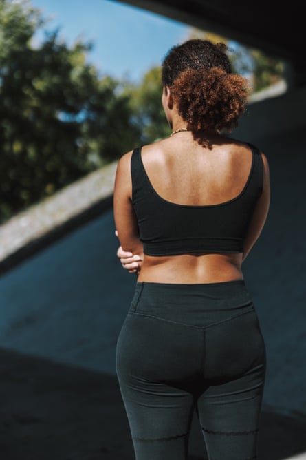 Young woman in sportswear spending time outdoors