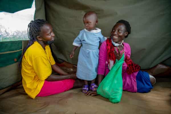 Elizabeth with Susan and her youngest child, Rehema.