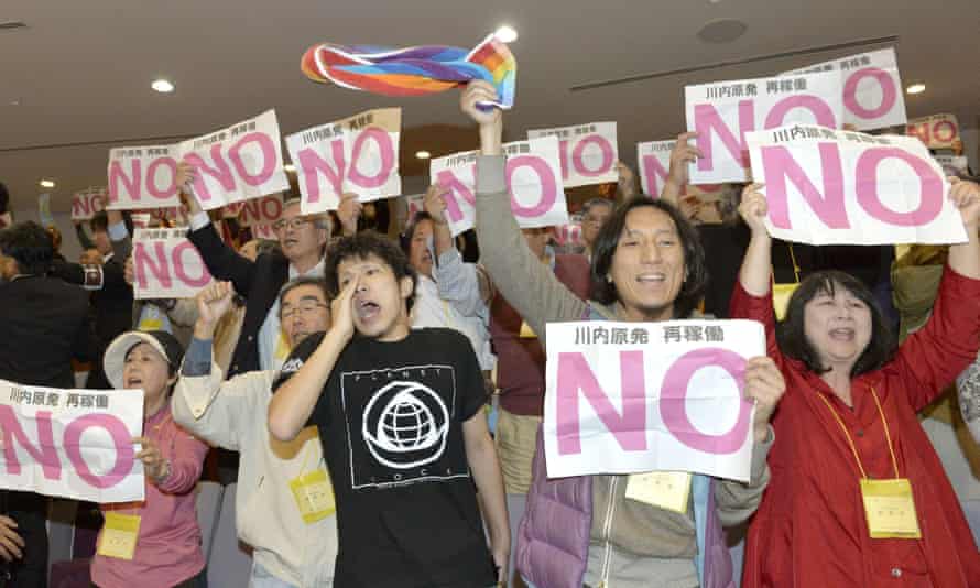 Anti-nuclear protestors demonstrate at the prefectural assembly session in 2014 which agreed to resume nuclear power generation the Sendai plant near Satsumasendai.