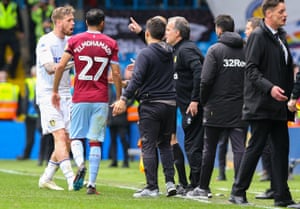 Pontus Jansson (left) in discussion with Marcelo Bielsa (fourth from the left) during the game against Aston Villa in April, 2019.