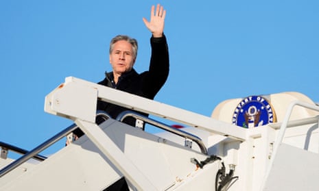 US secretary of state Antony Blinken waves as he boards a plane for Saudi Arabia.