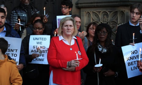 Debbie Makki (centre), the mother of Yousef Makki, at a candlelit vigil outside Manchester Cathedral in October 2019.