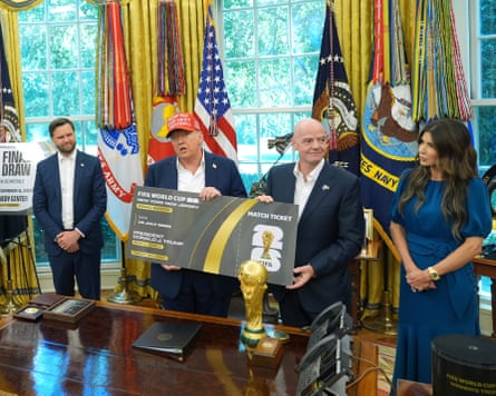 Gianni Infantino and Donald Trump with the World Cup at the Oval Office in August 2025.