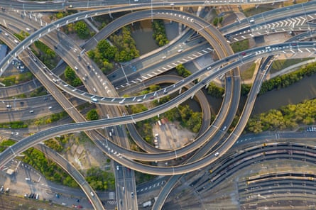 Intertwined freeway off and on ramps seen from above