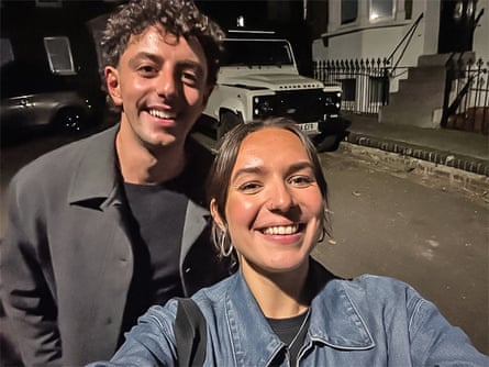 A selfie of the couple outside at night
