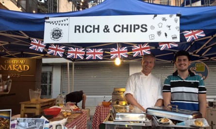 Richard Bampfylde, left, at his Rich & Chips stall in Beirut.