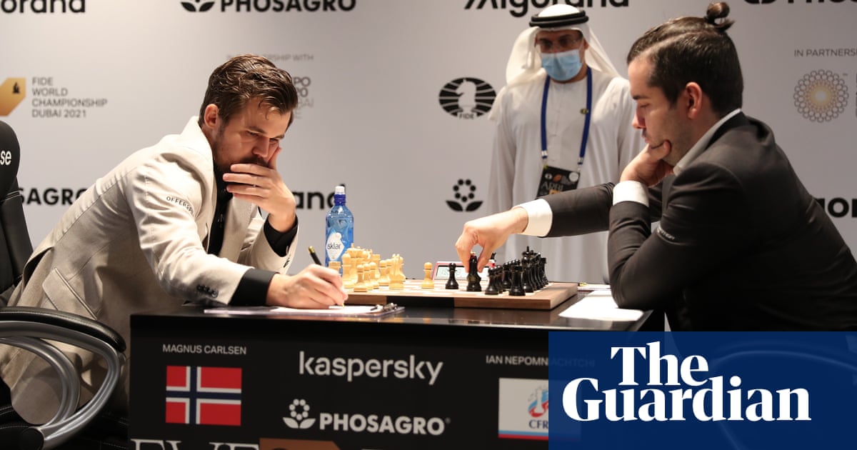 Magnus Carlsen on verge of retaining title after Nepomniachtchi blunder