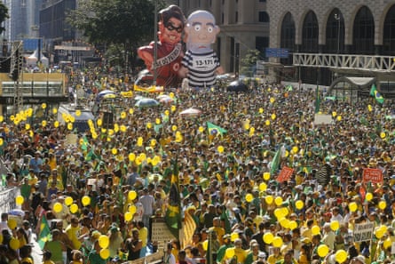 Demonstrators demanding the impeachment of Brazil’s president Dilma Rousseff march during a protest.
