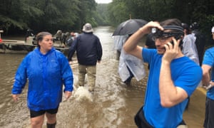 Dale Montalban, right, coordinates a rescue in Woodlands