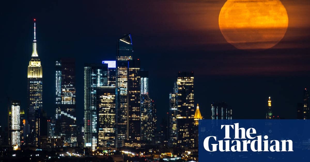 The strawberry moon – in pictures