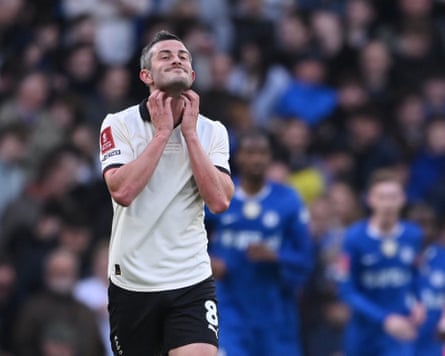 Port Vale's Ben Garrity looks dejected after Chelsea's Tosin Adarabioyo scores their fourth goal