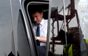 Jeremy Hunt arrives in a helicopter