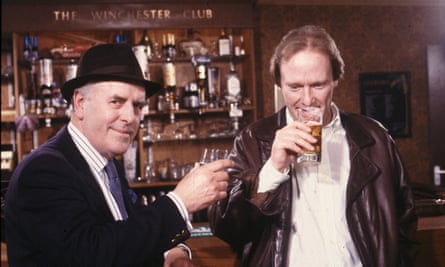 Dennis Waterman, right, with George Cole in Minder, 1985.