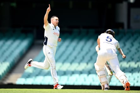 Scott Boland of Victoria celebrates after taking the wicket of Sam Konstas