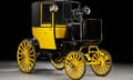 An electric Bumble Bee taxi, used in London between 1897-99, on display in the gallery