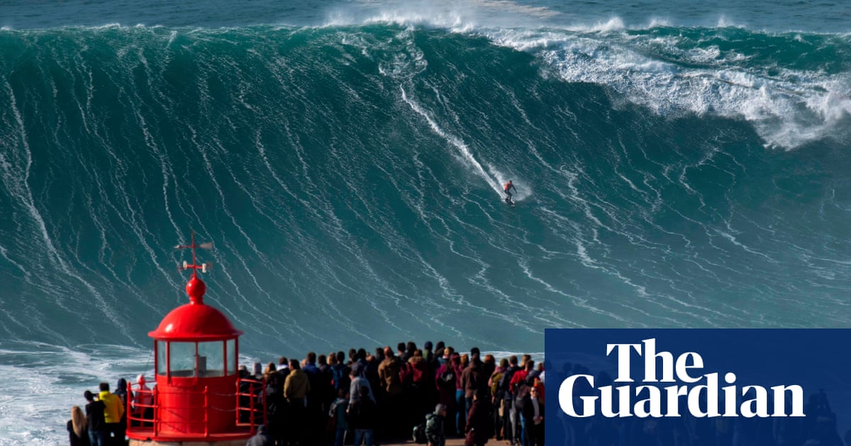 Catching big waves at Nazaré - in pictures