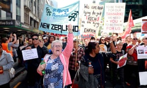 Thousands of teachers, parents and schoolchildren march up Queen Street as they protest in Auckland, New Zealand. 
