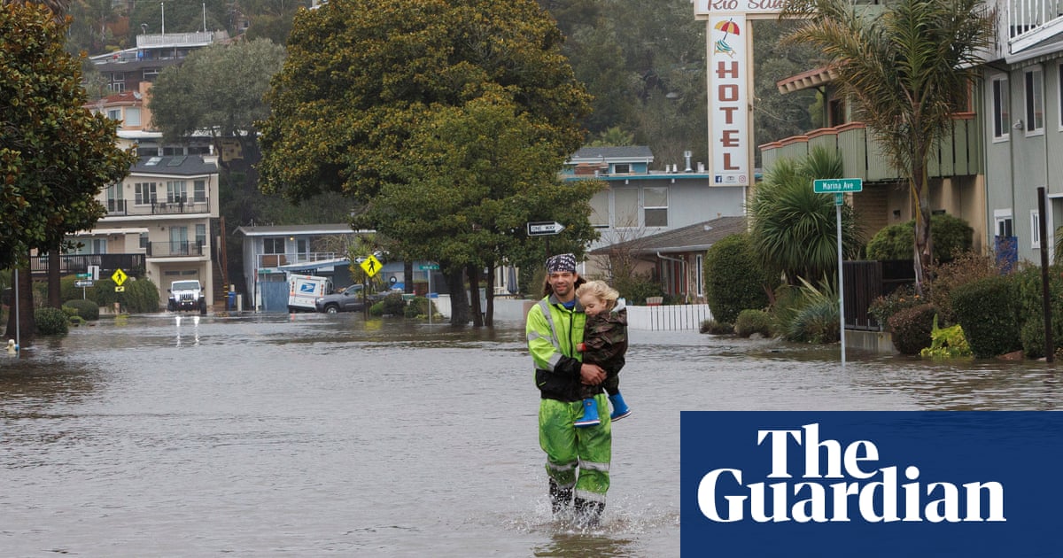 California storms: thousands without power as more wind rain and snow hit – The Guardian US