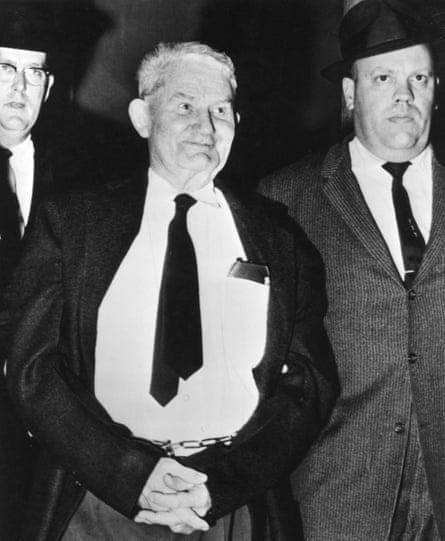 Richard Paul Pavlick is led into a courtroom in 1962