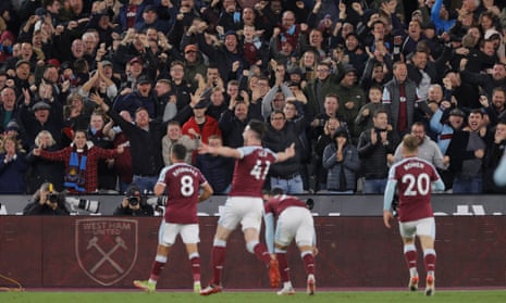 West Ham players and fans celebrate their second goal in the win against Liverpool at the London Stadium.