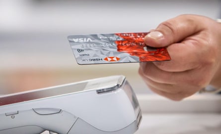 An HSBC bank debit card being used to buy something using contactless.