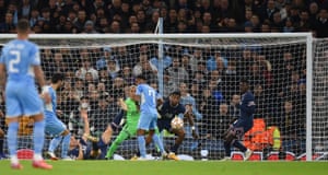 Manchester City’s Ilkay Gundogan (left) hits the post with this shot.