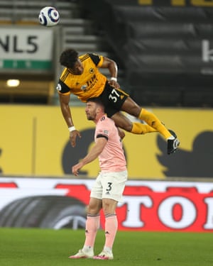 Adama Traore of Wolverhampton Wanderers and Enda Stevens of Sheffield United